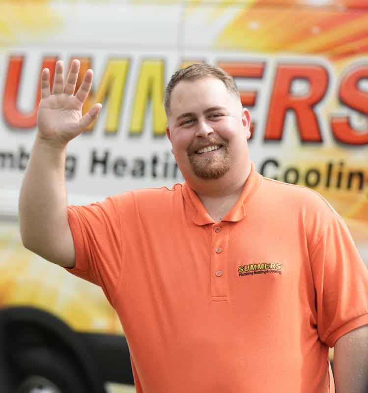 summers plumbing heating & cooling technician waiving to customer